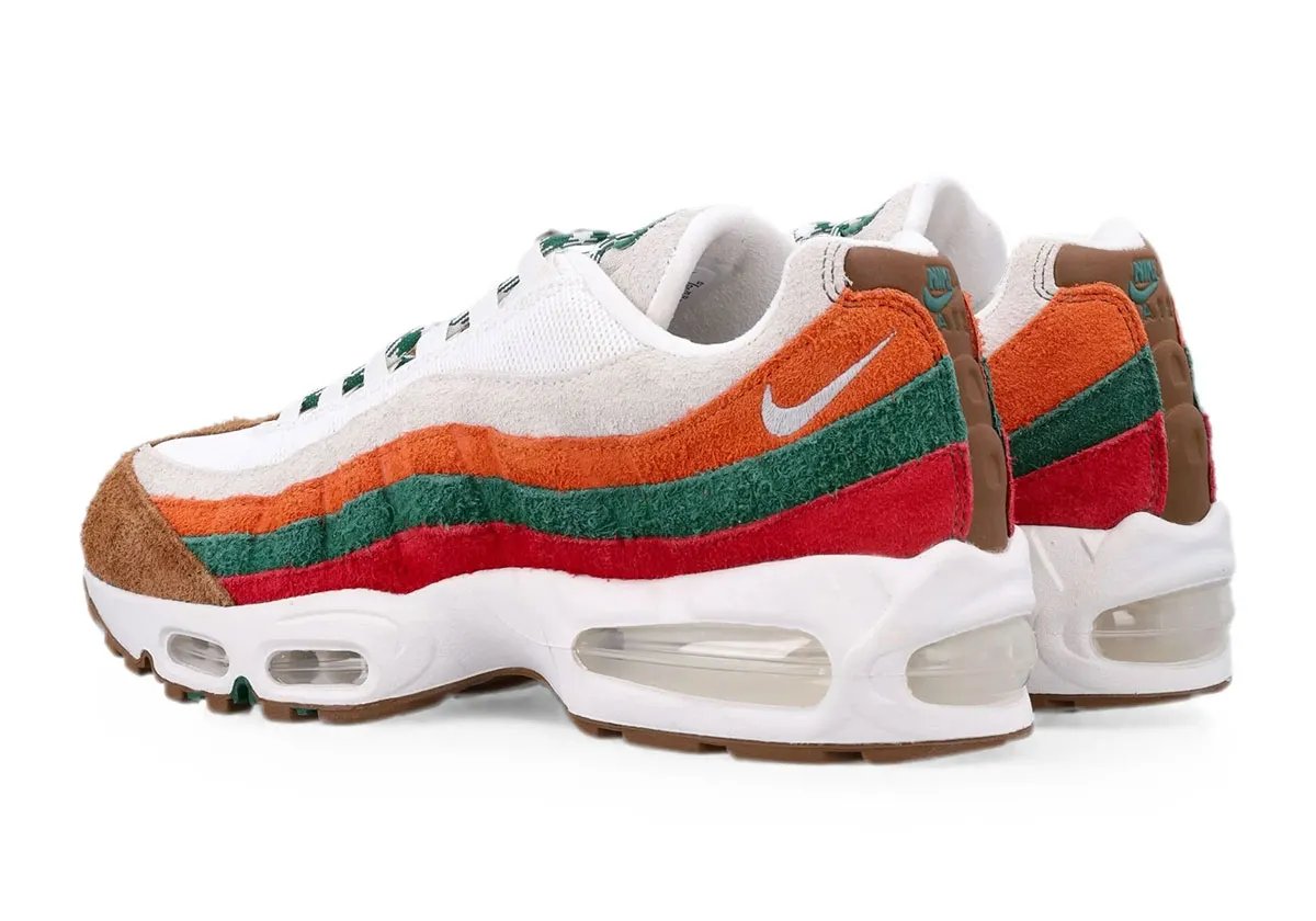 Nike Air Max 95 in 7-Eleven-inspired colorway with Gym Red, Sport Green, and Total Orange suede overlays and Light British Tan accents - detail view 2