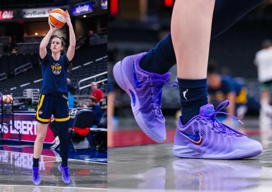 Caitlin Clark wearing the Nike Caitlin 1 in lavender purple with layered Swoosh details during WNBA game - detail view 1