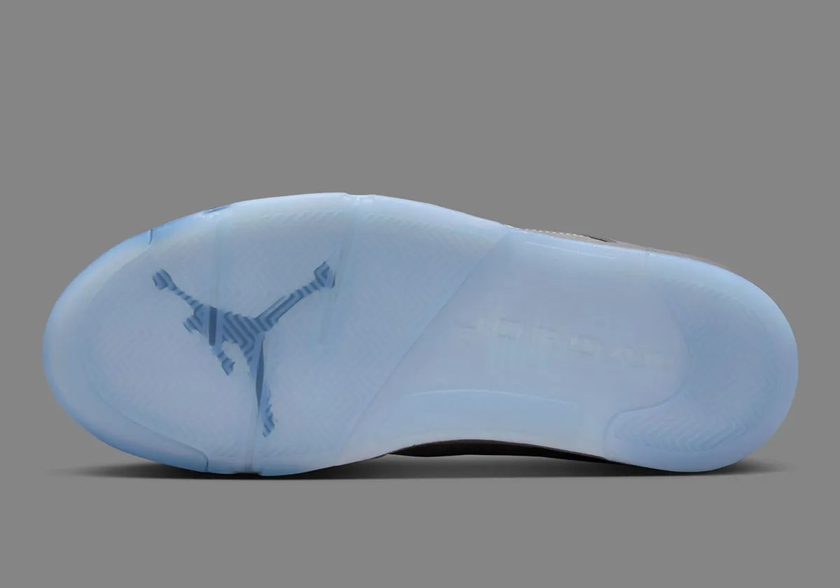 Air Jordan 5 Wolf Grey colorway, full side profile view showing shark-tooth midsole and lace-lock system - detail view 2