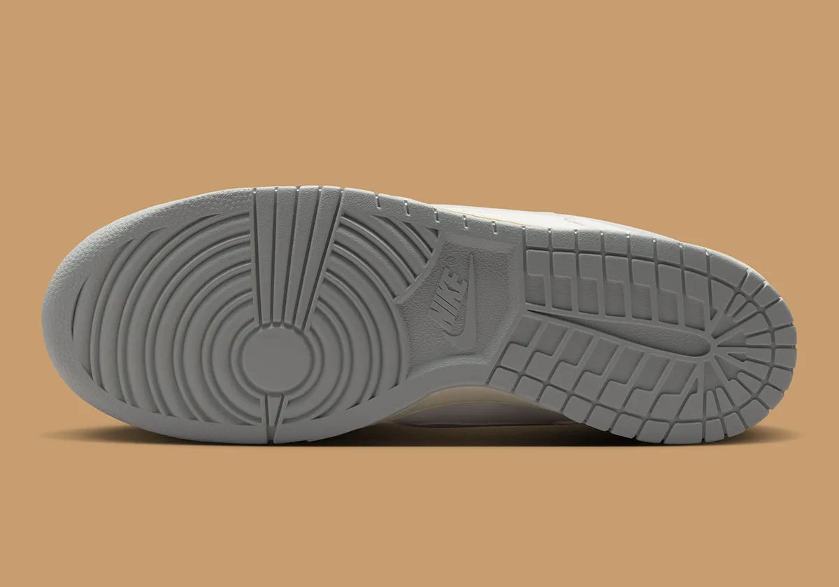 Nike Dunk Low Bubble Swoosh Pack featuring embedded Swoosh branding in neutral colorways - detail view 2