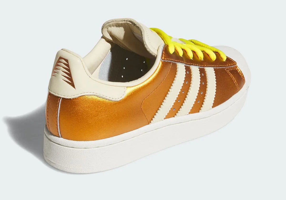 adidas Anthony Edwards Superstar in Metallic Gold leather with off-white stripes and signature rubber toe cap - detail view 1