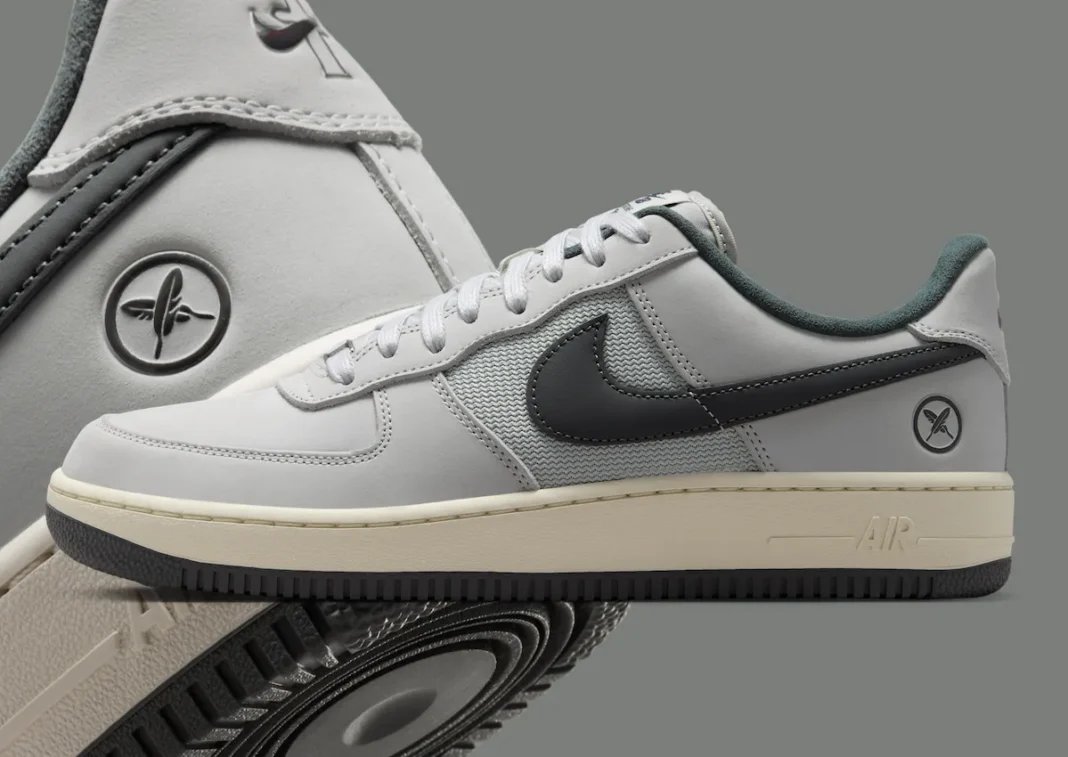 Yuto Horigome x Nike SB Air Force 1 Iron Grey featuring off-white leather upper with grey mesh panels and personalized heel branding - detail view 1