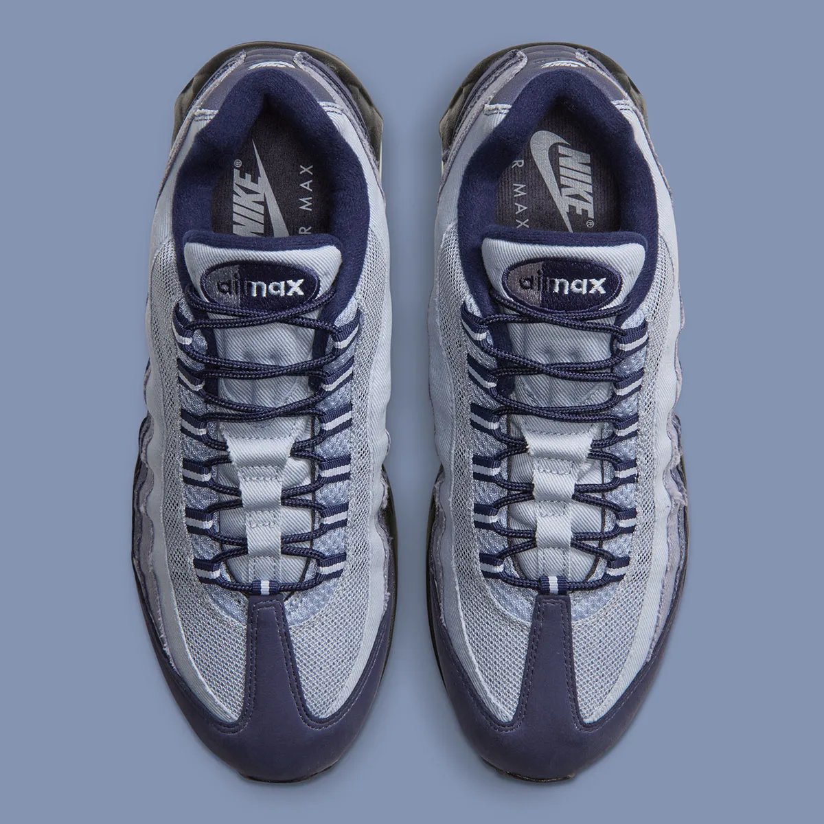 Nike Air Max 95 Ashen Slate displaying gradient denim construction across side overlays with light blue, medium, and dark denim tones - detail view 4