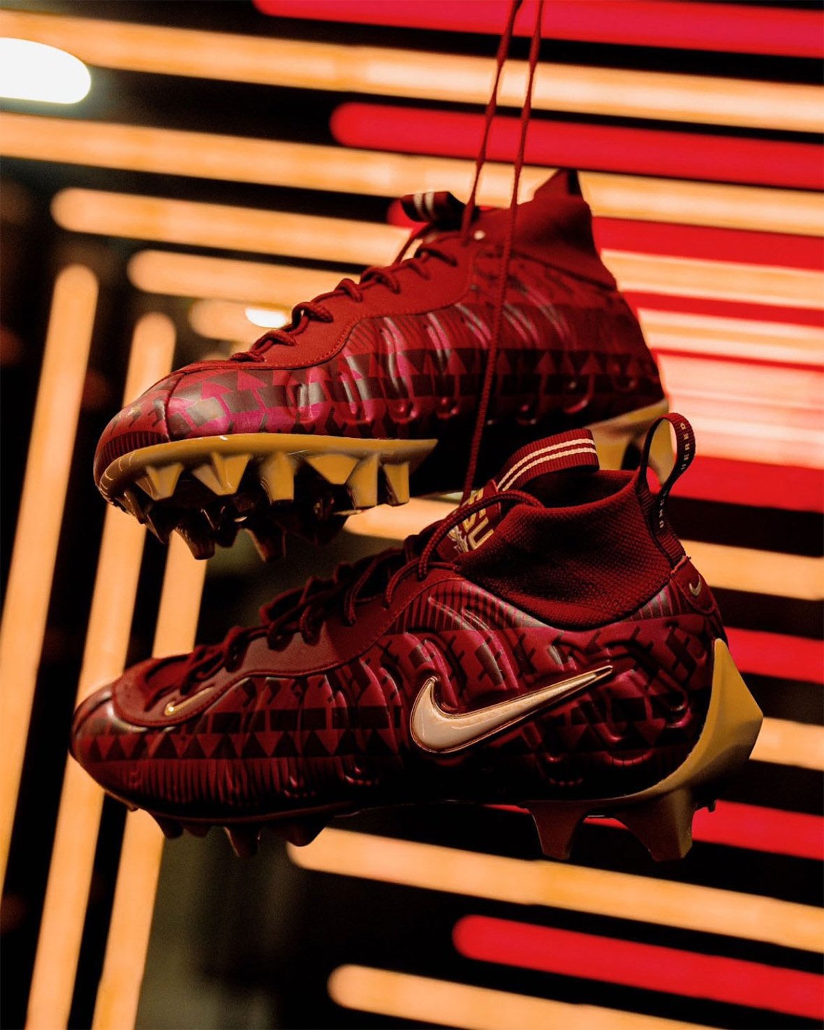 Nike Vaporposite Pro PE in garnet with gold FSU branding and pearly white Swoosh, designed as a player exclusive for Florida State football - detail view 2