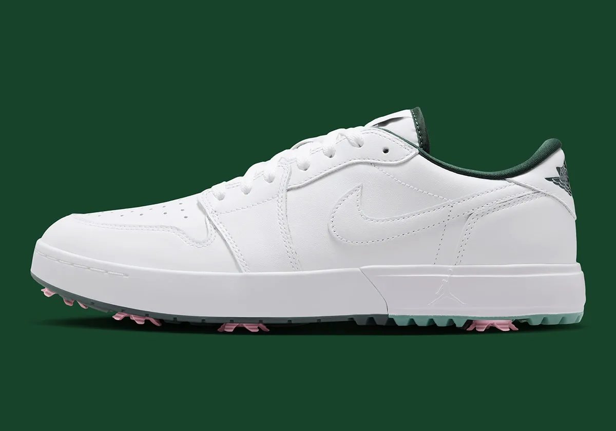 Air Jordan 1 Low Golf White/Fir featuring white leather upper, forest green lining, and pink spikes with redesigned golf sole - detail view 1