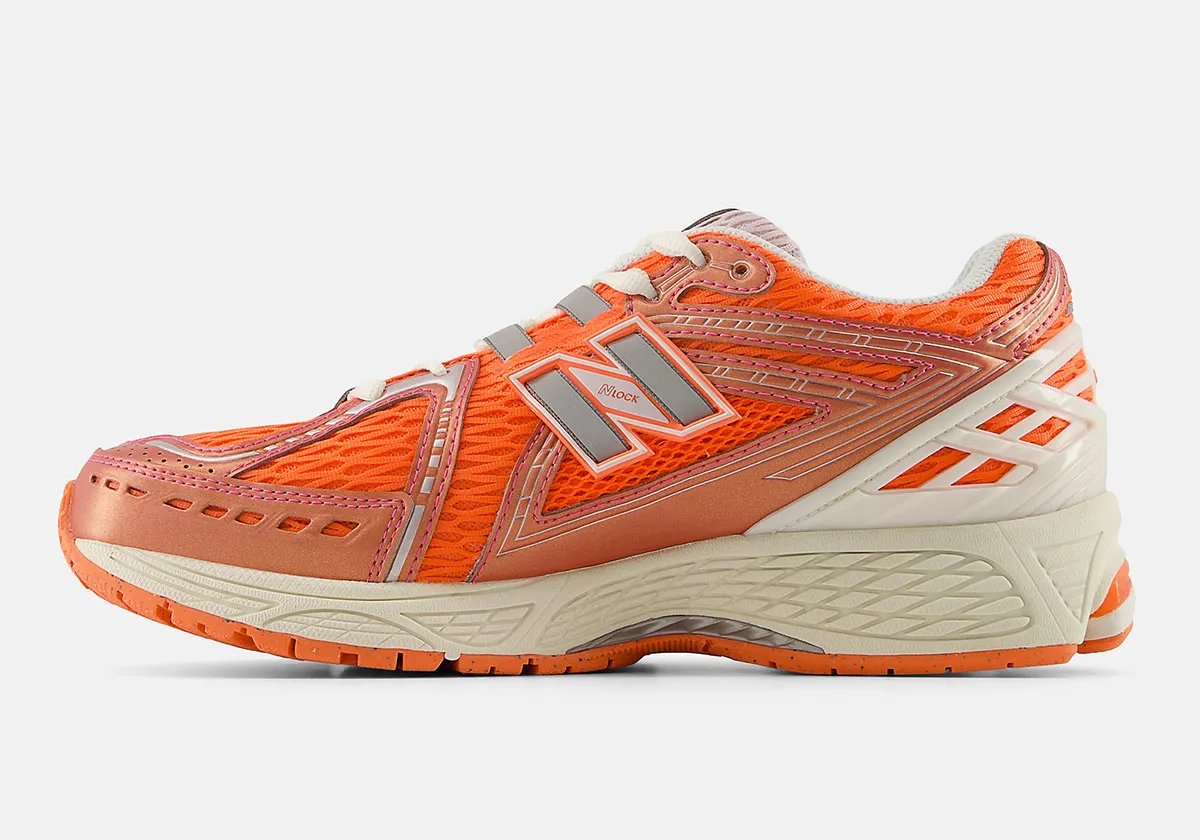 New Balance 1906R Creamsicle colorway featuring cream and soft orange tones on mixed-material upper with chunky sole - detail view 1