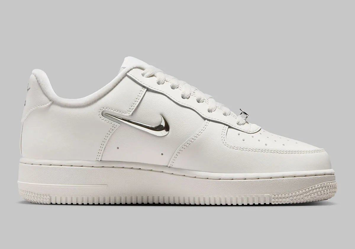 Nike Air Force 1 Low in Phantom with metallic silver mini Swoosh detail at quarter panel - detail view 3