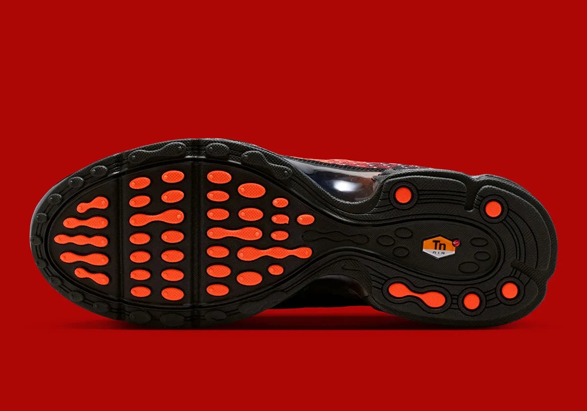 Nike Air Max Plus VII Fire Red featuring black base with Fire Red and Hyper Crimson patterning and translucent TPU overlays - detail view 2
