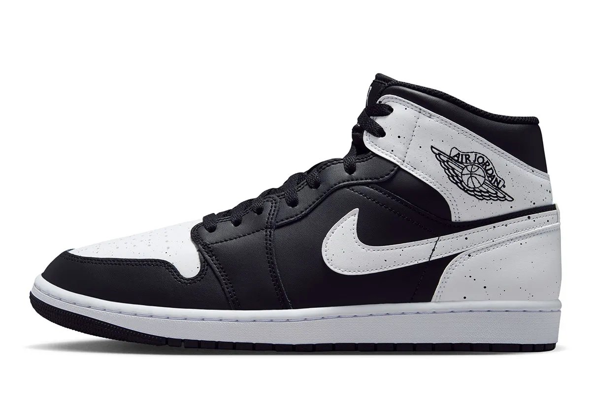 Air Jordan 1 Mid 'Oreo' in black and white leather with paint splatter detailing, Fall 2026 release - detail view 1