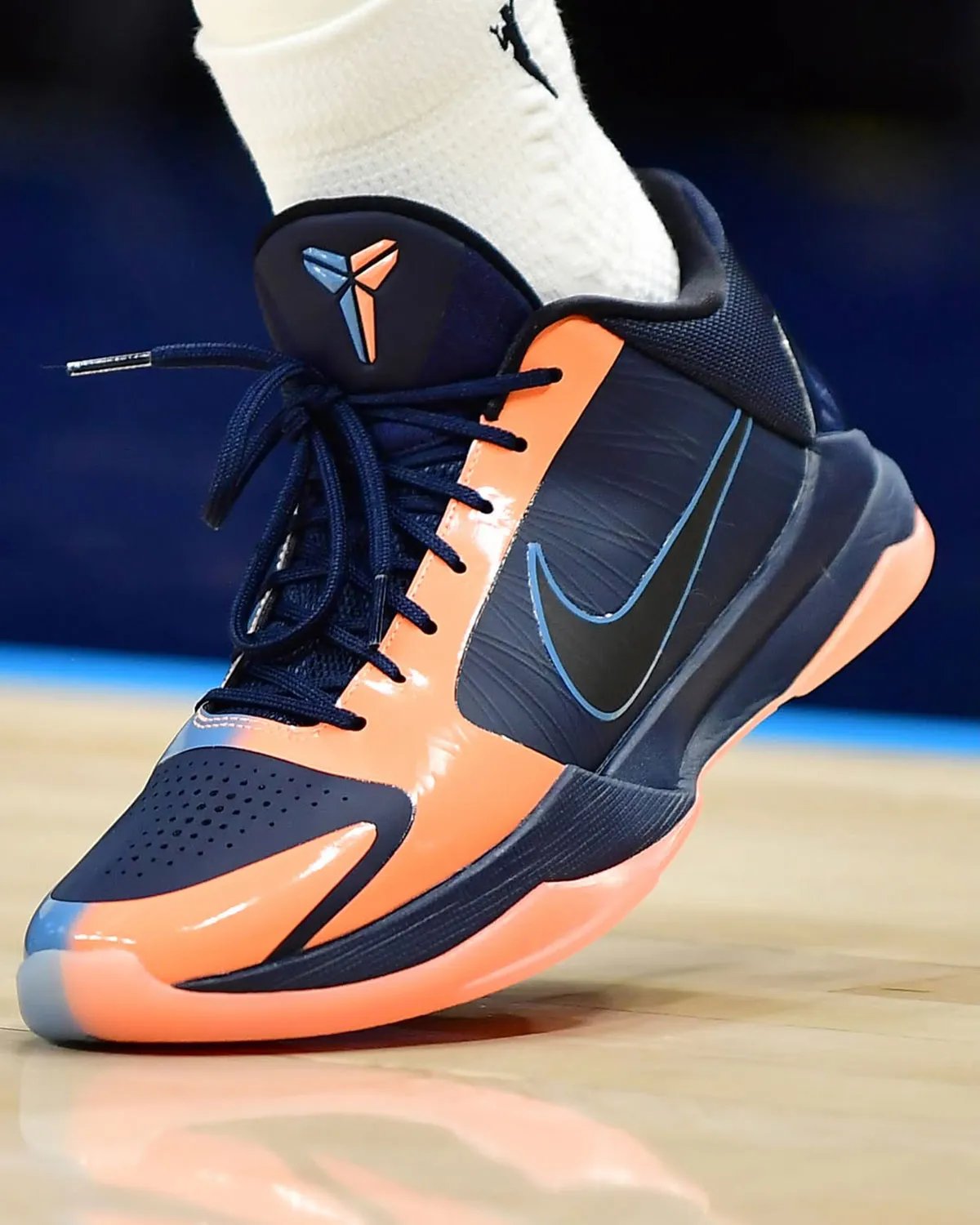 Arike Ogunbowale wearing exclusive Nike Kobe 5 Protro PE with split navy, coral, and blue colorway during Dallas Wings game - detail view 2