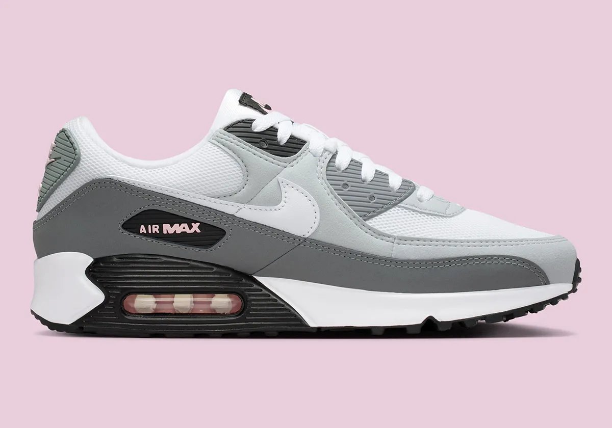 Nike Air Max 90 in Pink Foam colorway with visible Air unit and curved Swoosh geometry - detail view 2