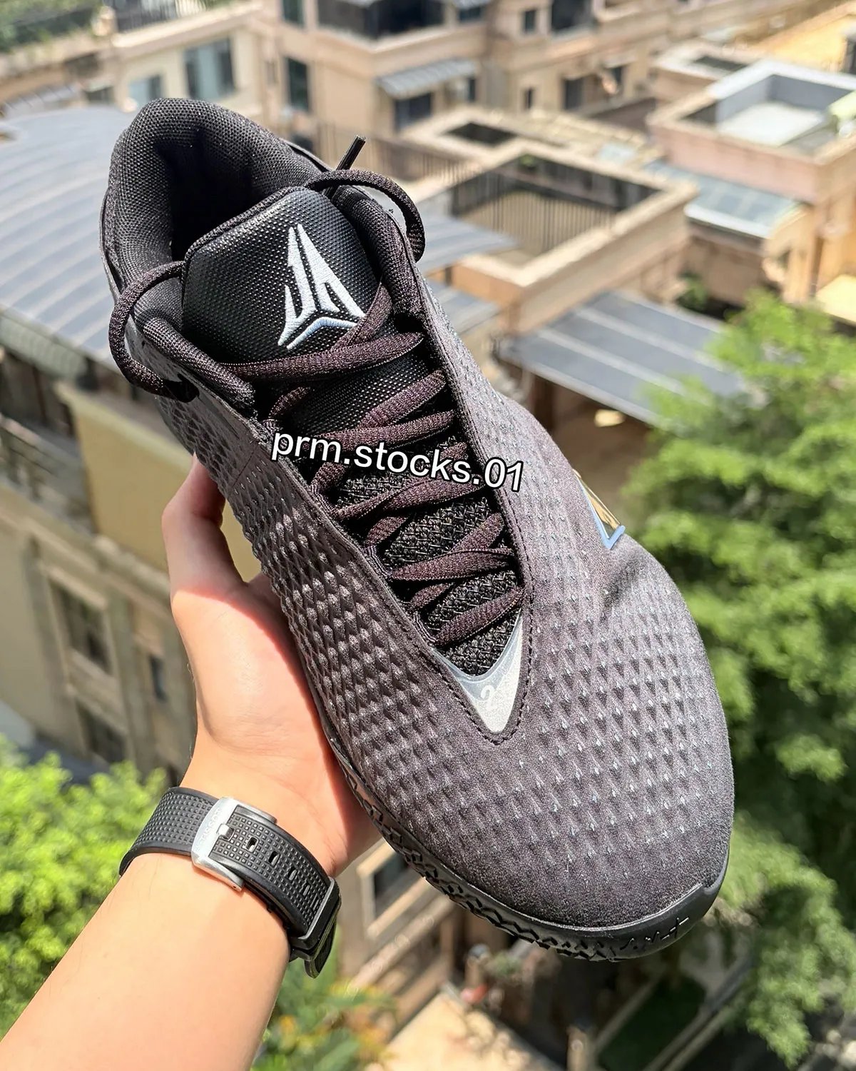 Nike Ja 4 'Dark Mode' in deep grey with chrome metallic 'A' graphic and cobalt accents - detail view 2