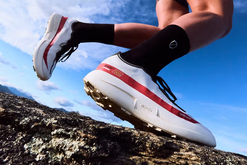 Norda 005 trail runner in Laser and Comet colorways, inspired by 1980s Group B rally racing aesthetics - detail view 1