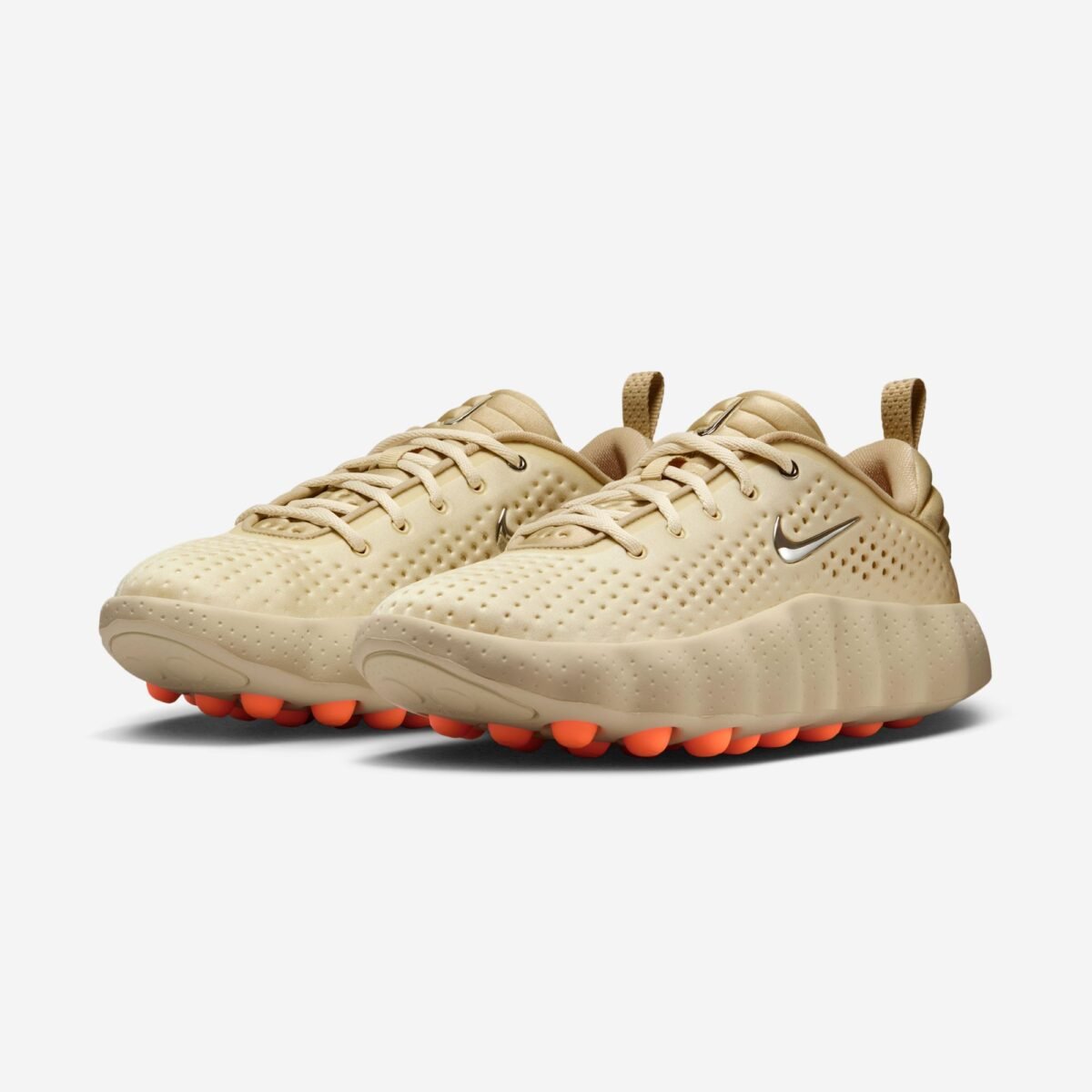 Nike Mind 002 in Light Smoke Grey colorway, full profile view showing neutral grey upper and structured silhouette - detail view 1