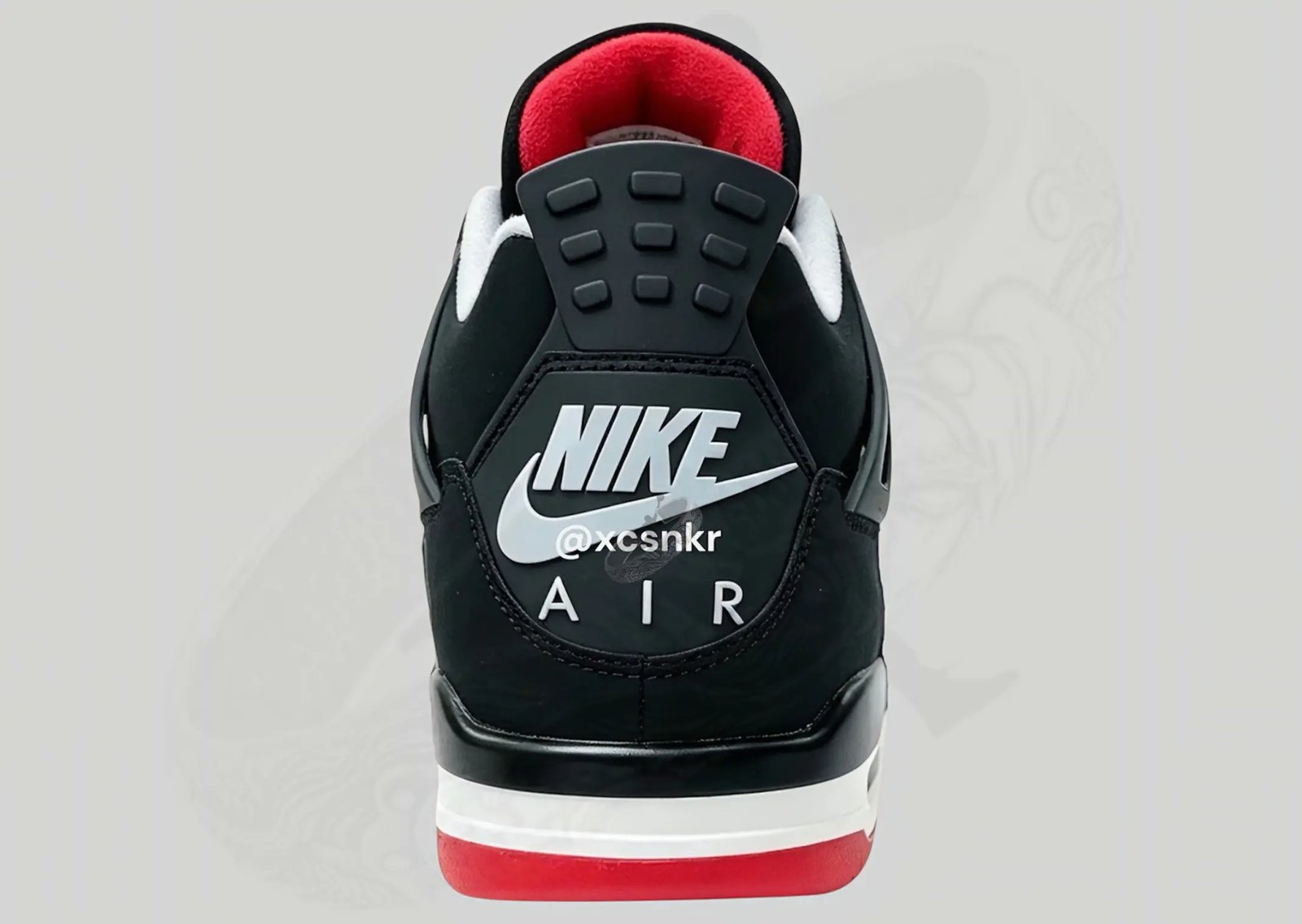 Air Jordan 4 Retro Bred in black nubuck with grey lace wings and red accents, OG 1989 colorway recreation - detail view 4