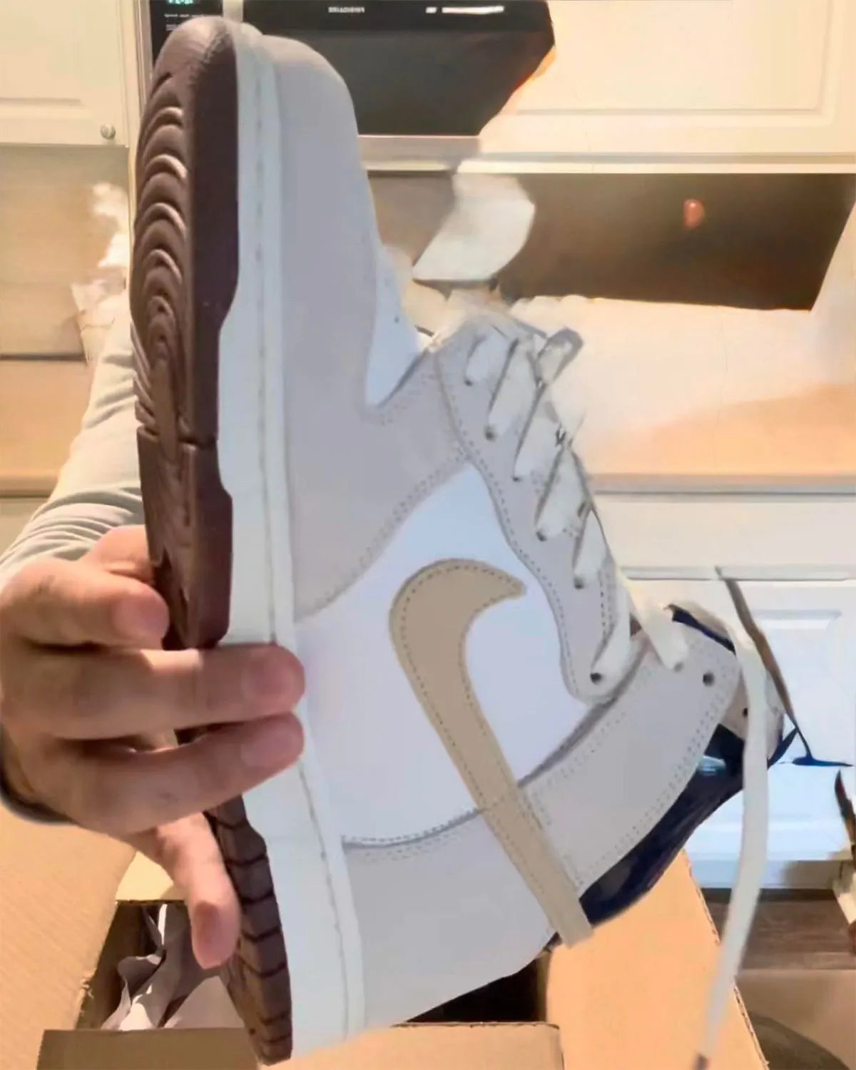 Nike SB Dunk High in white leather and ivory suede with Blue Void patent leather collar, arriving July 2026 via Beyond - detail view 1