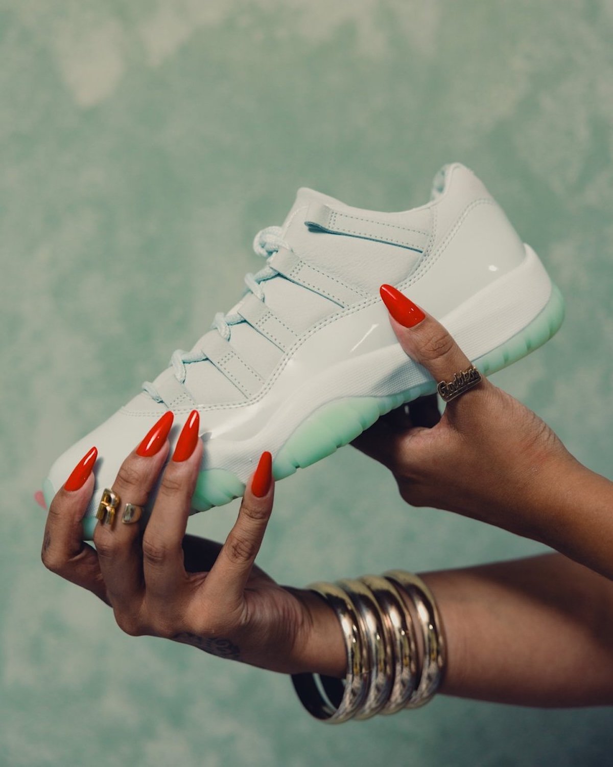 JAIDE x Air Jordan 11 Low in light sage with patent leather mudguard and translucent outsole - detail view 2