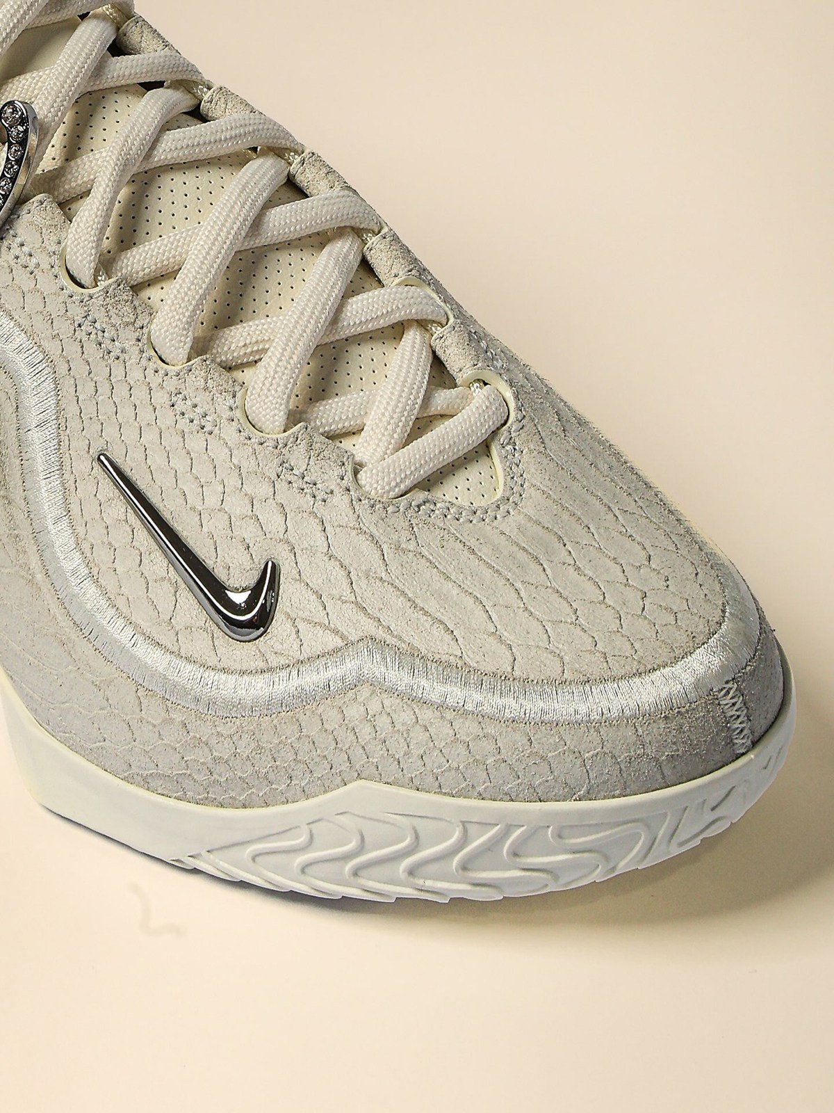 Nike LeBron 23 'White Label' in off-white leather with reptilian scale detailing and metallic Swoosh, WNBA All-Star 2026 collection - detail view 2