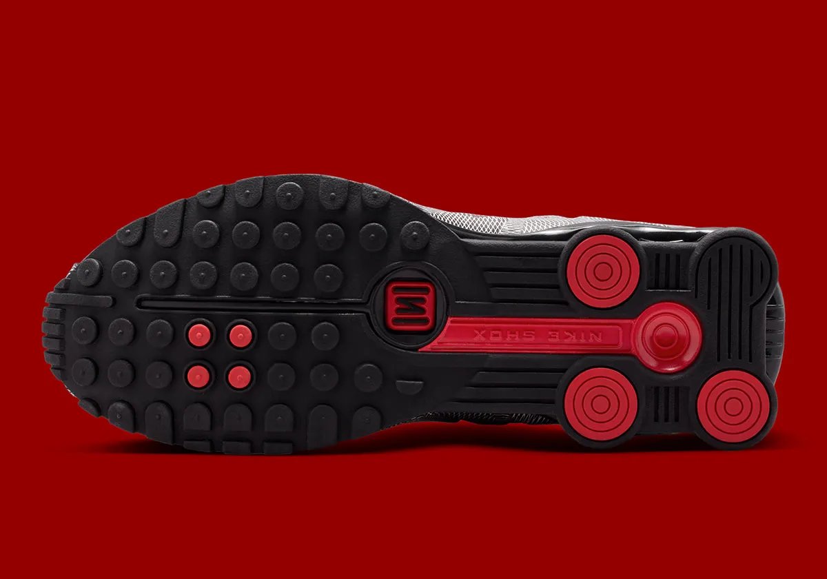 Nike Shox R4 Optical Illusion featuring black and white kinetic patterning across the upper with red mini Swoosh accents - detail view 2