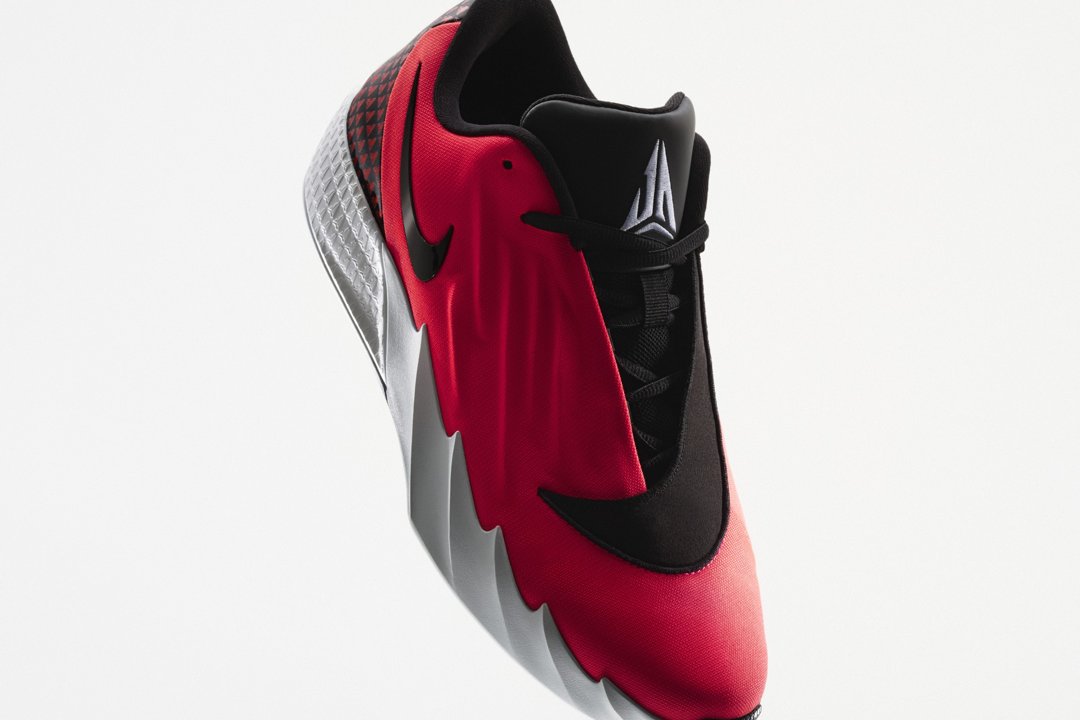 Nike Ja Twelve Time in Solar Red colorway with photon dust and cobalt bliss accents, September 2026 release