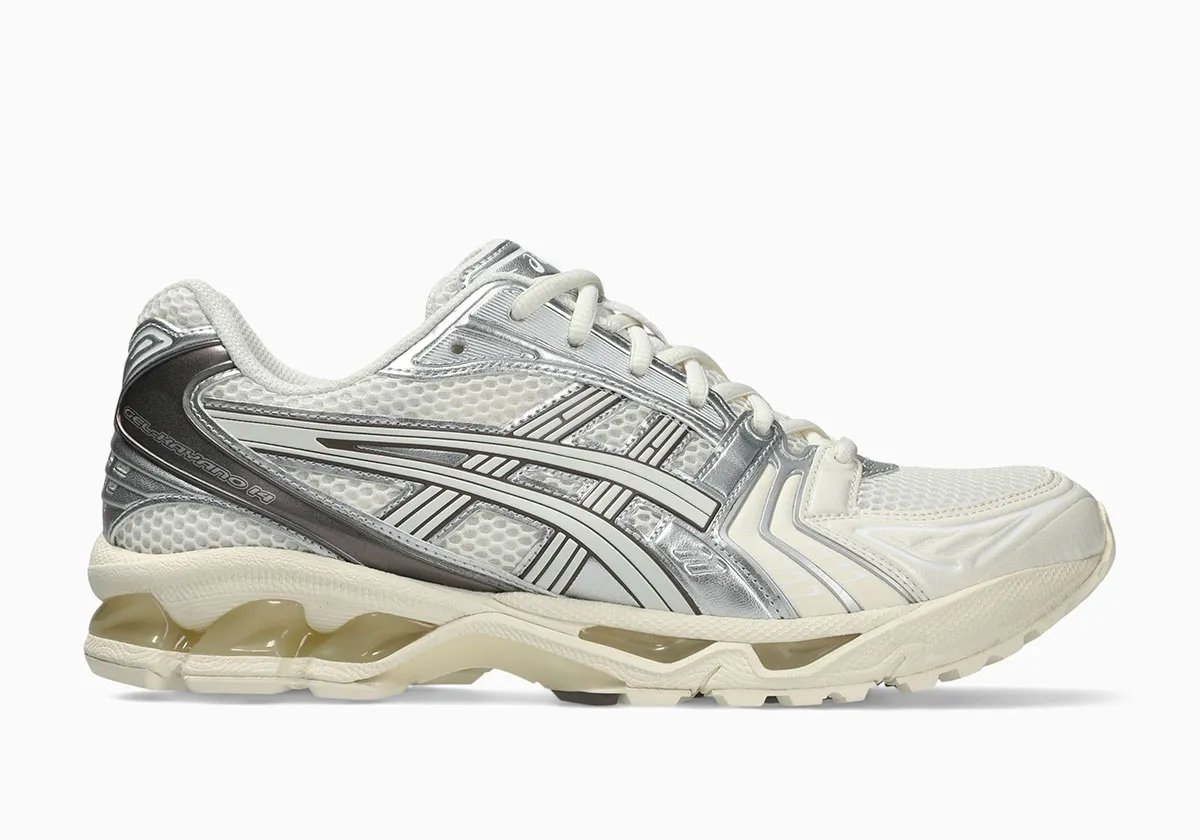 ASICS GEL-Kayano 14 in Cream and Cocoa Powder colorway, showcasing off-white mesh upper with metallic silver side panels and brushed cocoa heel detailing - detail view 1