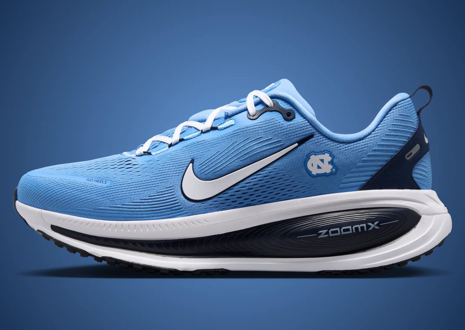 Nike Vomero 18 NCAA Pack featuring multiple school colorways with institutional logos positioned beneath the lateral Swoosh panel - detail view 5