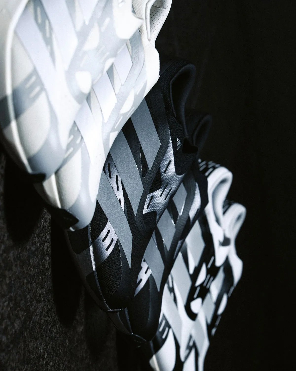 adidas EVO SL Laceless in profile, showing reinforced synthetic layers and minimal sock-collar construction - detail view 4