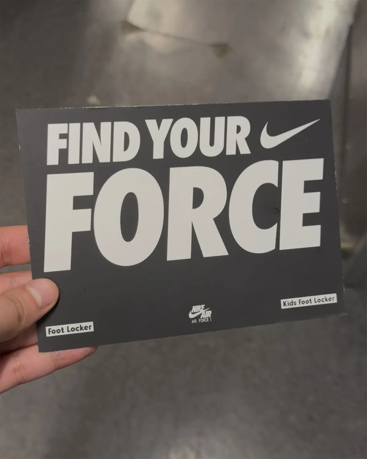 Nike Air Force 1 Low in Triple White colorway, part of Foot Locker's employee giveaway campaign - detail view 2