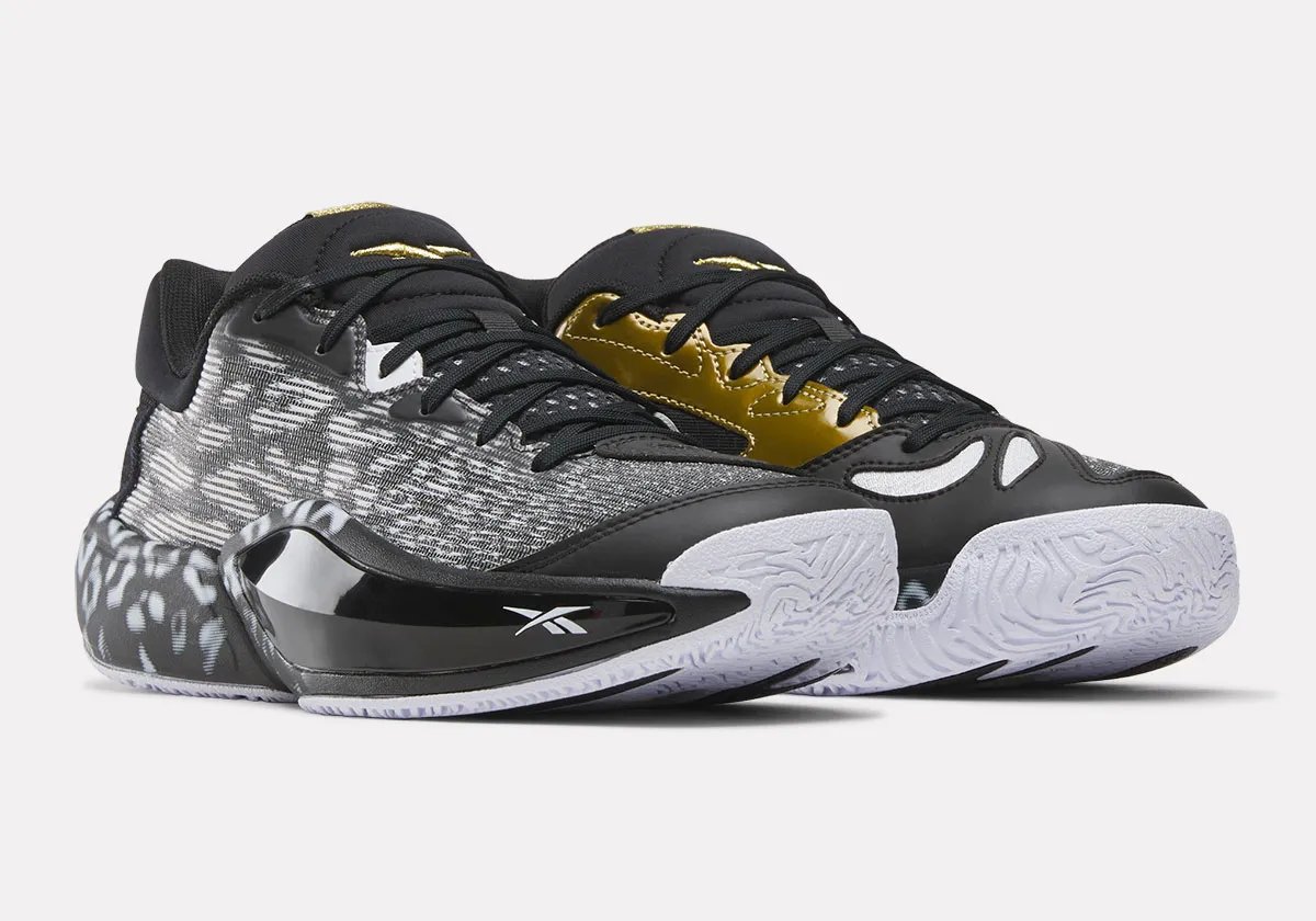 Reebok Engine A 26 performance basketball shoe in full lateral view showing court-ready design and cushioning system - detail view 4