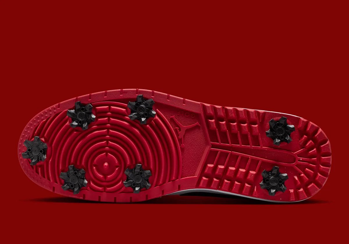 Air Jordan 1 Low Golf in Chicago red, white, and black colorway with golf-specific traction pattern and reinforced leather construction - detail view 2