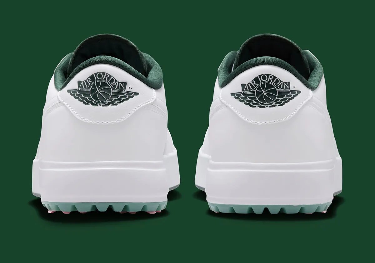 Air Jordan 1 Low Golf White/Fir featuring white leather upper, forest green lining, and pink spikes with redesigned golf sole - detail view 5