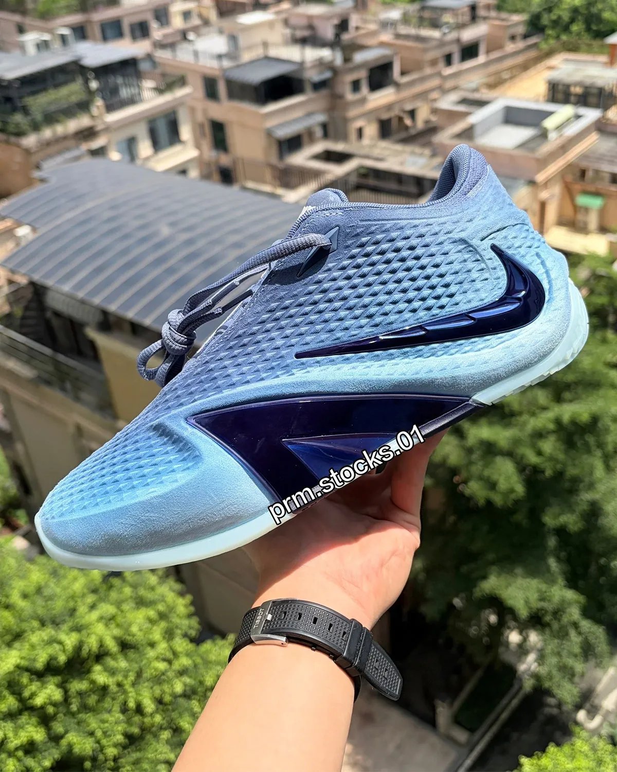 Nike Ja 4 "Jaws" in Diffused Blue, Blackened Blue, and University Red with shark teeth tongue detailing, inspired by classic film poster design - detail view 1