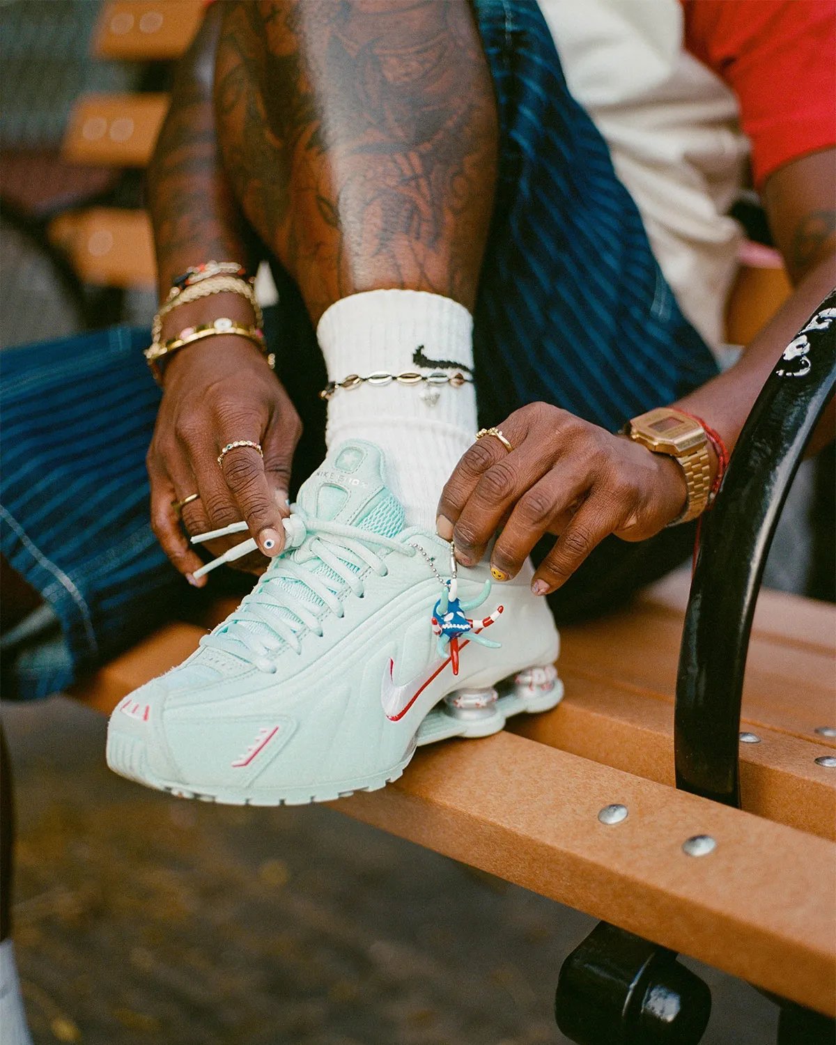Nike Shox R4 Puerto Rico colorway featuring flag-inspired palette and Vejigante mask charm detail - detail view 3