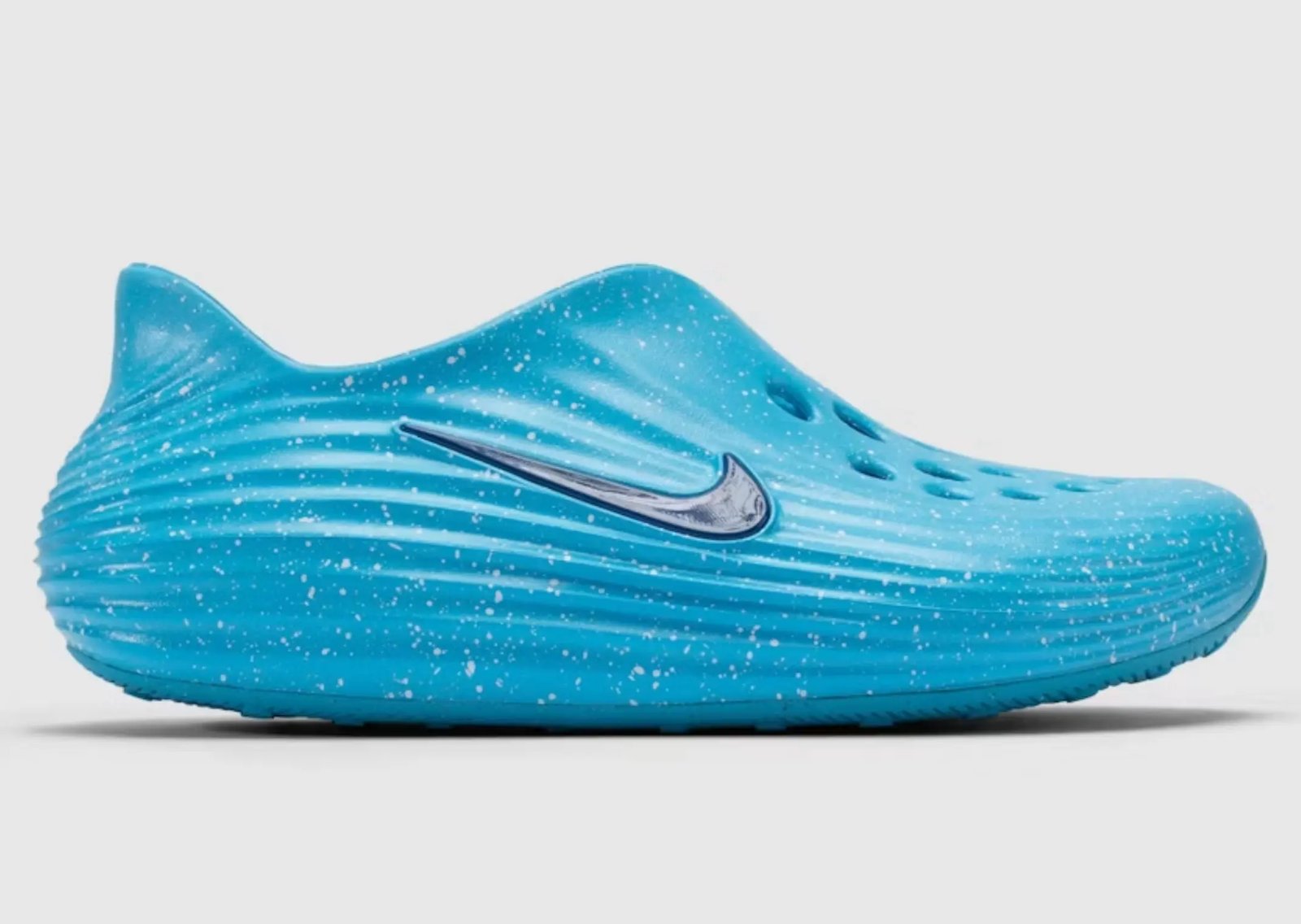 The Whitaker Group x Nike ReactX Rejuven8 Splatter Pack in Blue Drift, Black Signal, and Violet Rush colorways with contrasting paint splatter uppers - detail view 3