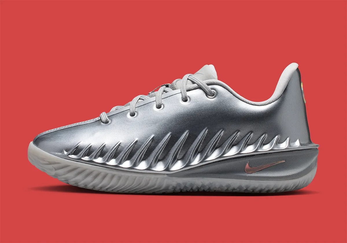 Nike GT Cut 4 in Metallic Silver colorway, full side profile view showing chrome-coated upper - detail view 1