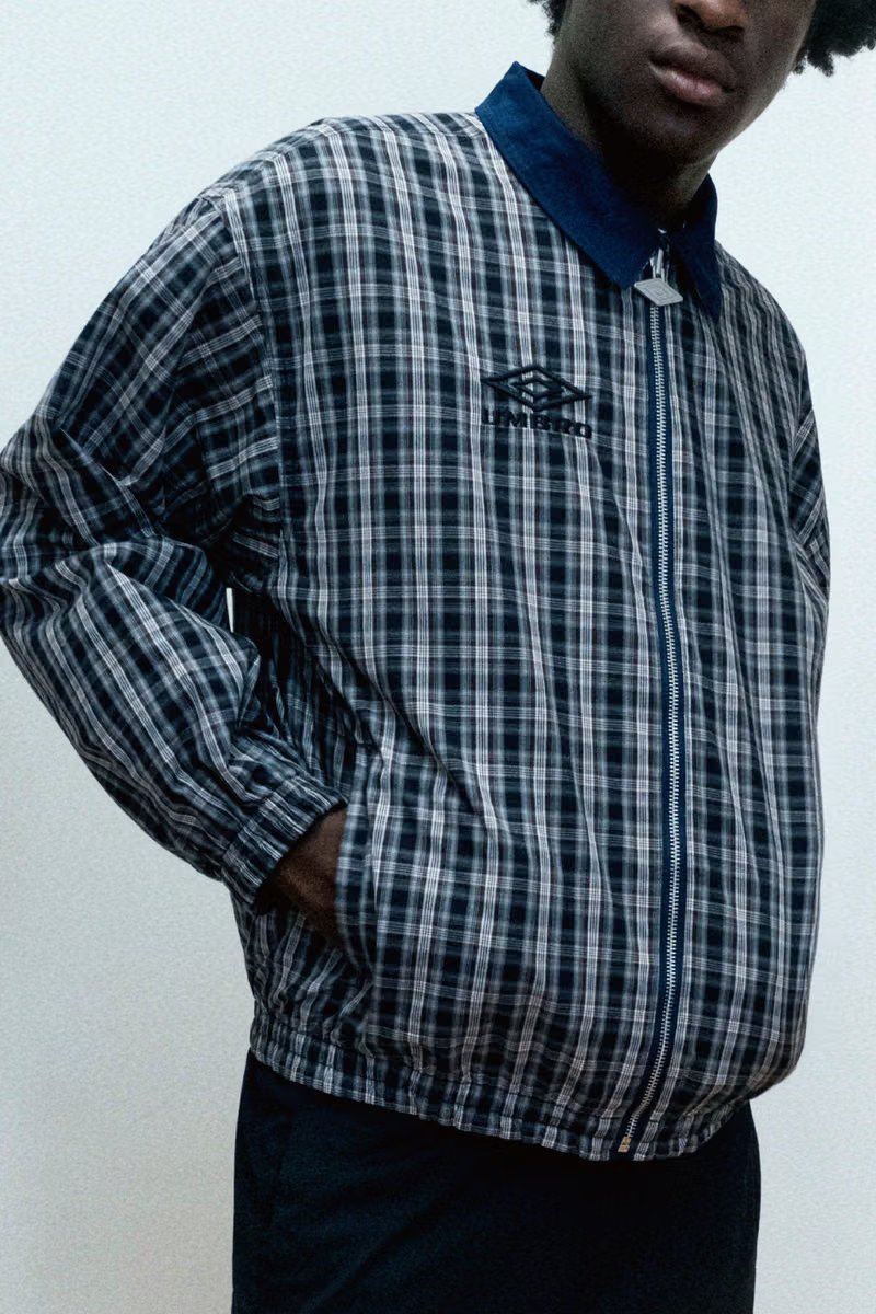 PLEASURES x Umbro capsule collection featuring oversized football shirts and track jackets inspired by 1990s British terrace and music culture - detail view 1