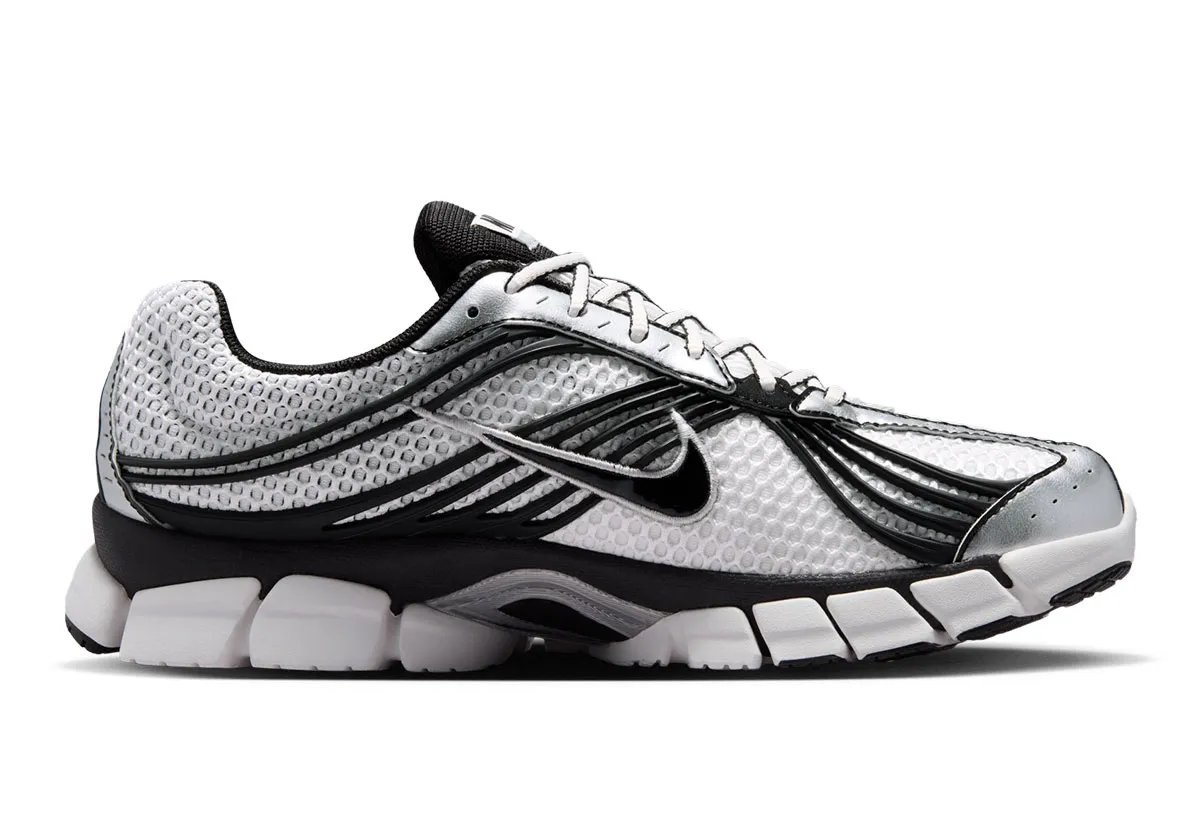 Nike Zoom Skylon 11 in black and white colorway showing wavy mesh upper and Lunarlon midsole - detail view 2
