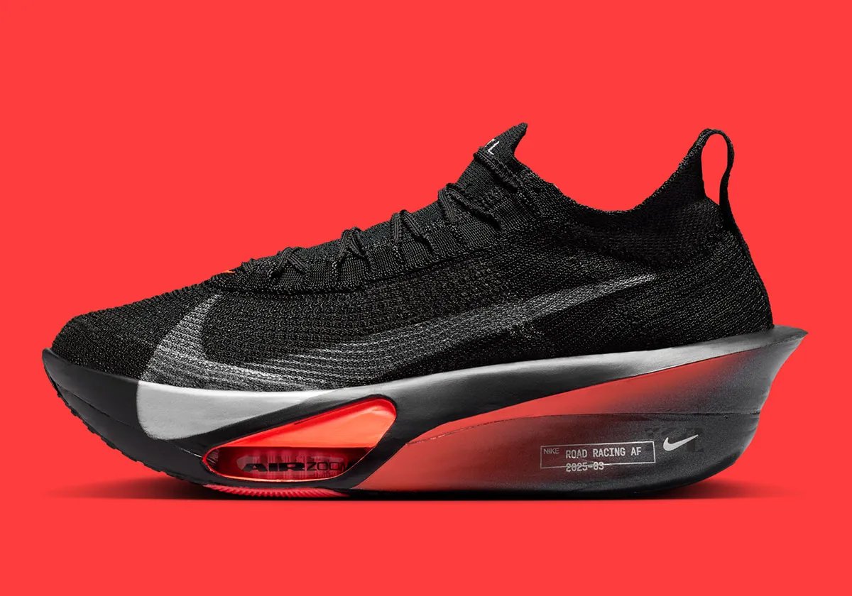 Nike Alphafly 3 in Black, Hyper Crimson, and Wolf Grey with silver Swoosh carabiner clip - detail view 1