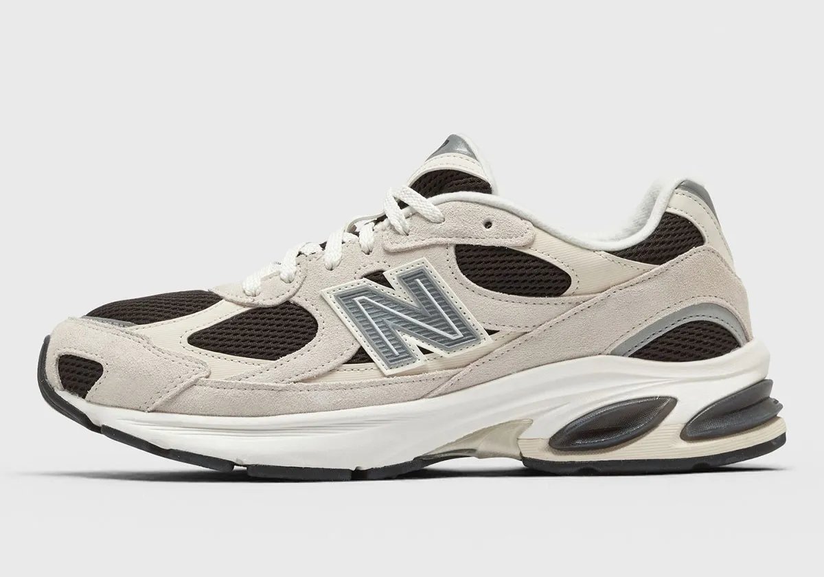 New Balance 2010 in Sea Salt suede with Black Cement accents and reflective branding - detail view 2